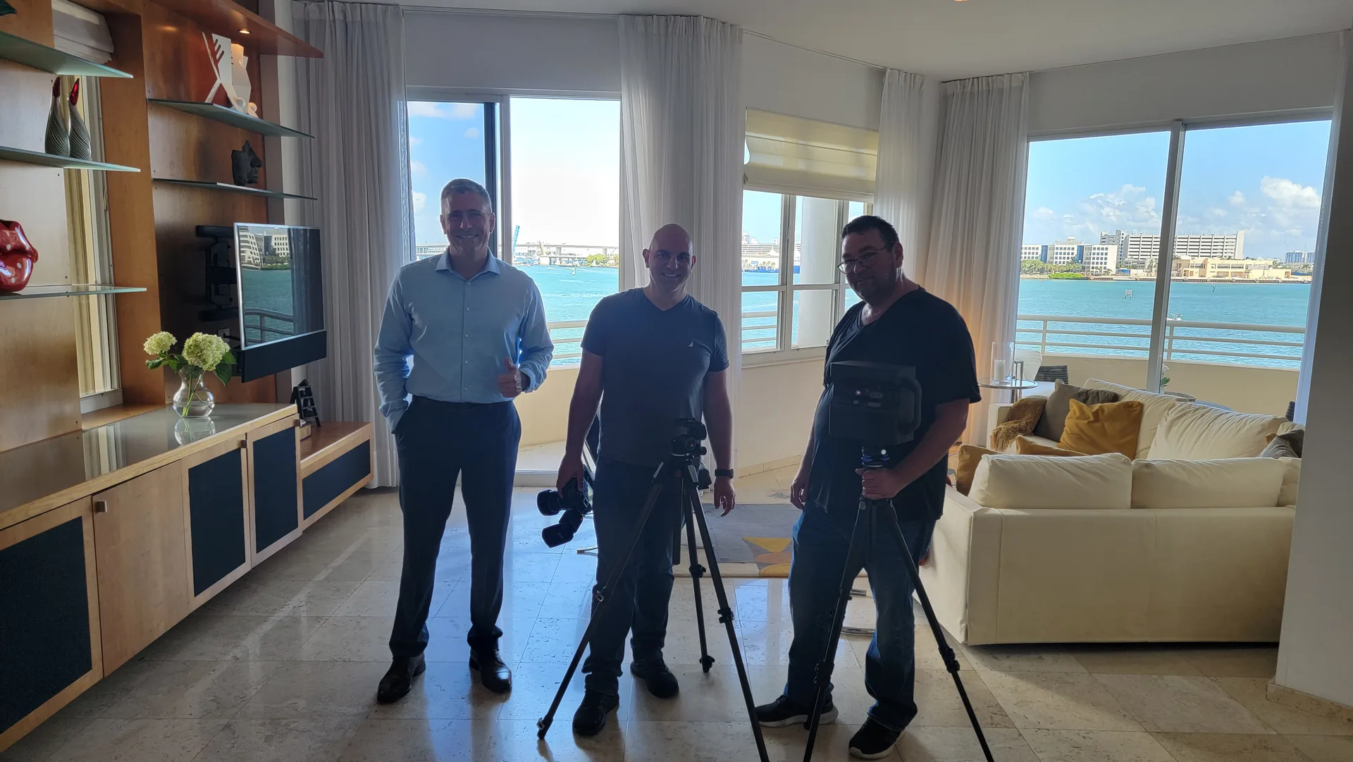 Carlos Uzcategui with a property media team in Miami