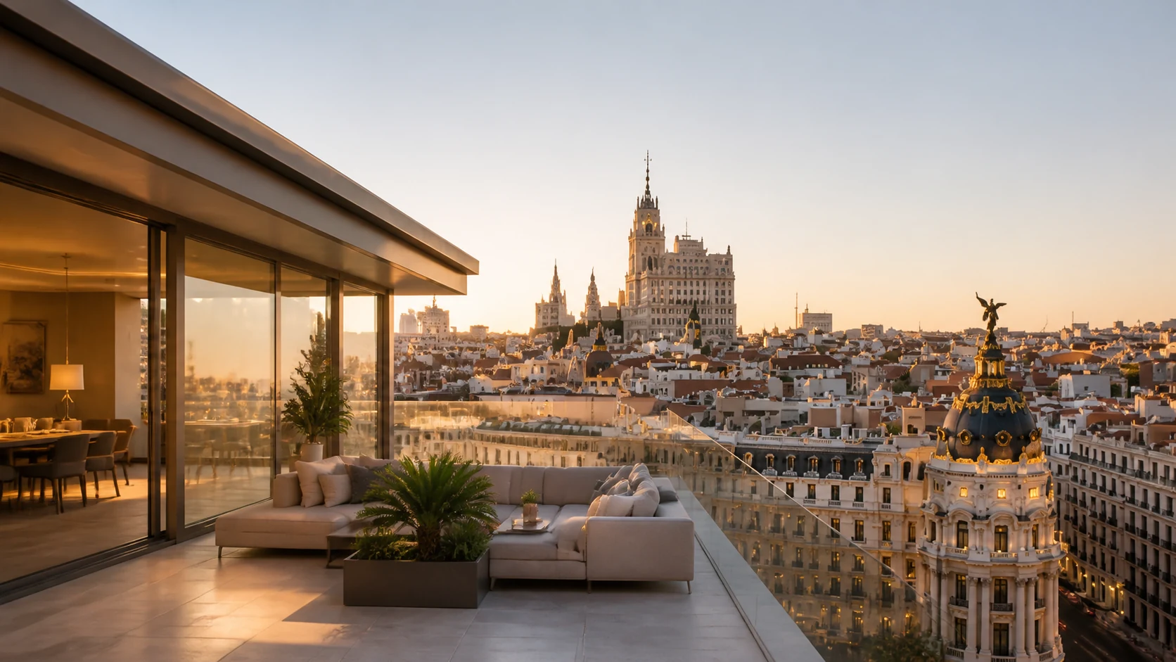 Madrid skyline from a contemporary international-property terrace at golden hour